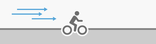 Ein Radfahrer mit Rückenwind