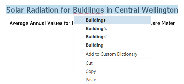 Menu contextuel affichant les corrections suggérées pour un mot mal orthographié dans un élément de texte de la mise en page